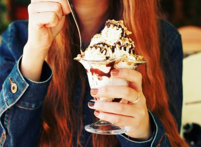 woman eating ice cream sundae